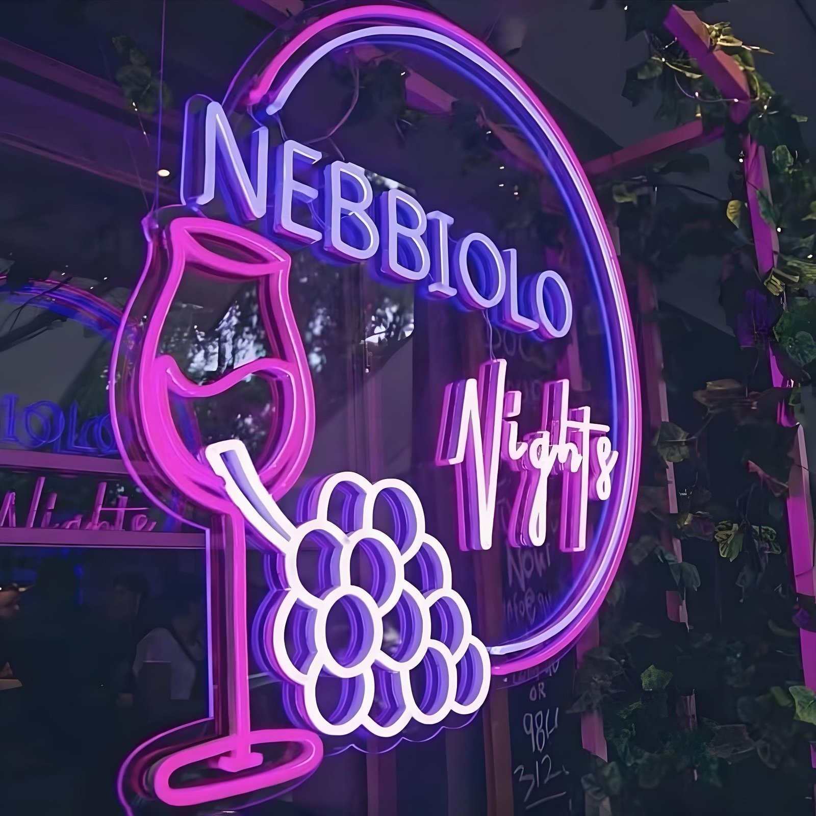 Hand-bent glass neon sign with glowing illuminated lettering, showing the warm authentic glow of traditional glass neon