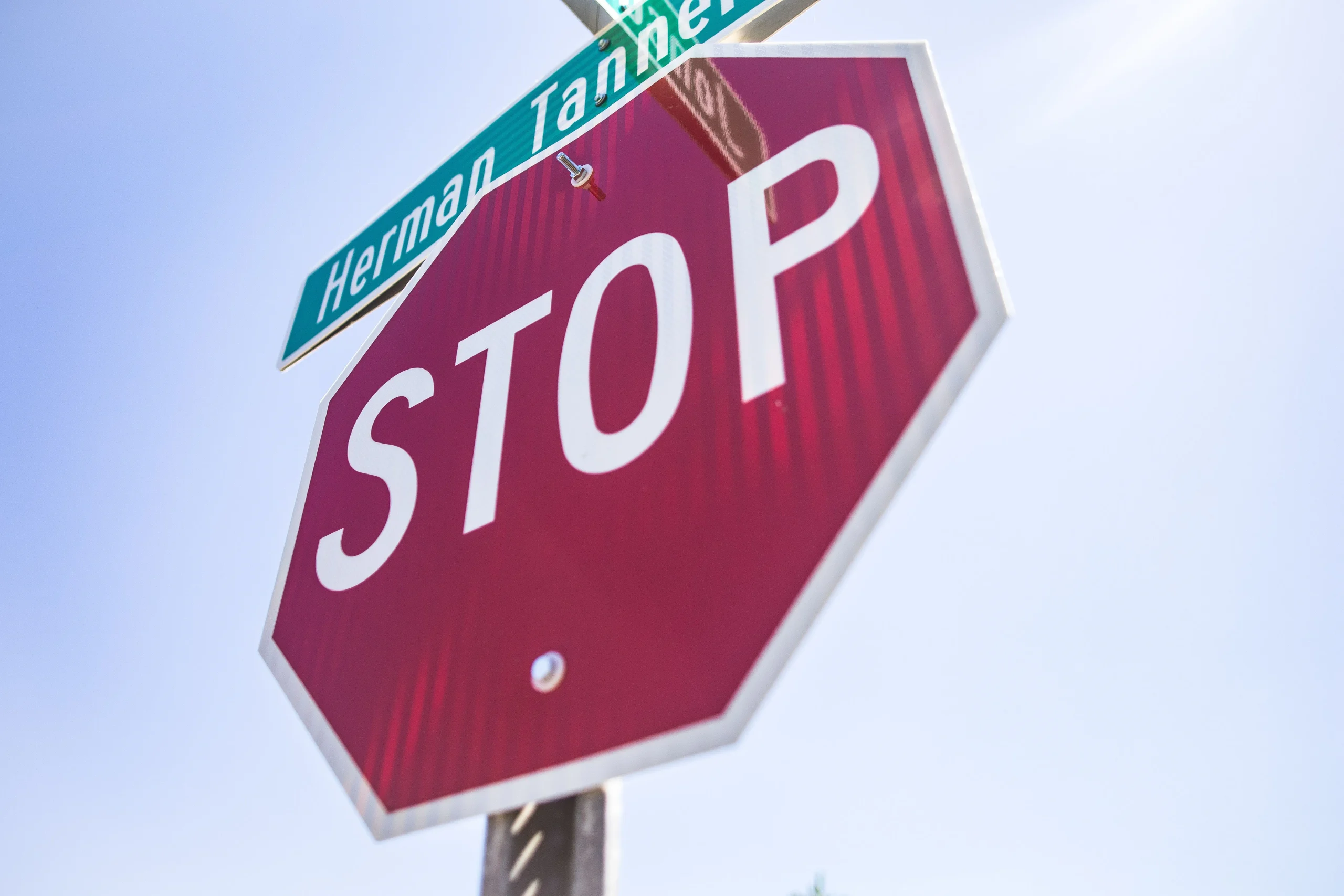 Red octagonal stop sign, a common regulatory traffic sign